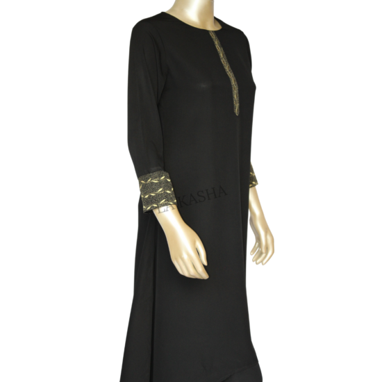 Kurti tunic with rich gold embroidery and asymmetrical bottom and pant set in crepe