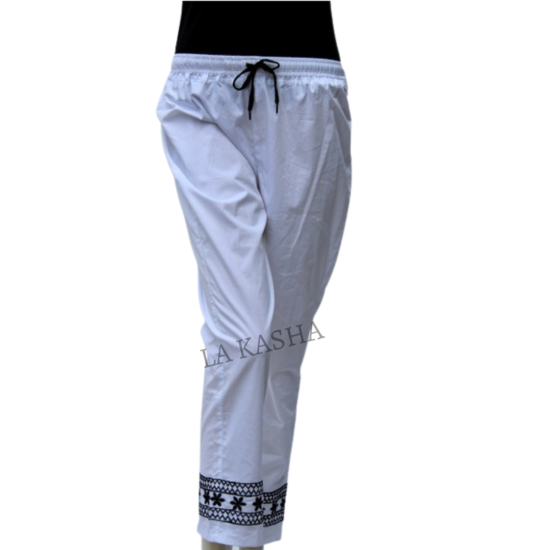 Pants in cotton poplin with all round elastic drawstring and handwork