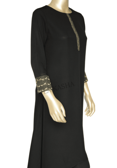Kurti tunic with rich gold embroidery and asymmetrical bottom and pant set in crepe