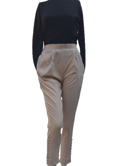 Pants in Poly crepe, band front elastic back with pockets and bottom design element.