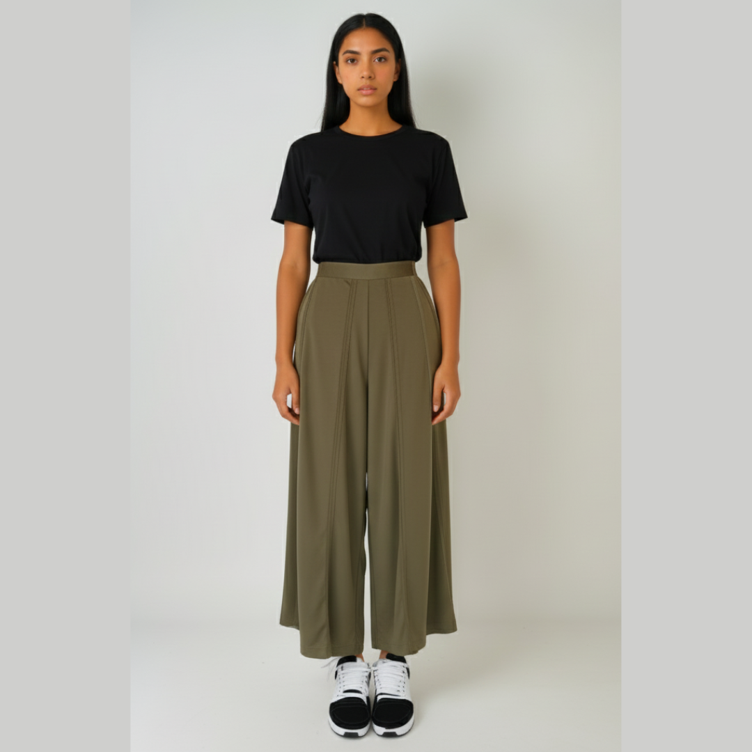 Georgia (90) Front view of model wearing olive wide-leg stretch poly-knit comfort pants with black t-shirt.